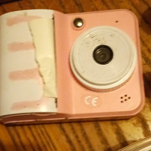 Pink compact digital camera - pink,