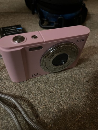 Pink compact digital camera - compact,