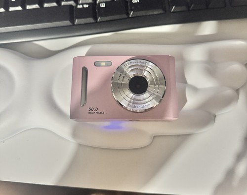 Pink vintage digital camera - pink,
