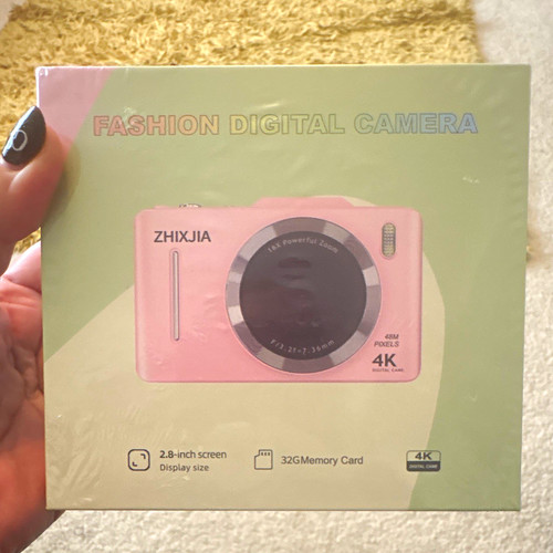 Pink compact digital camera - pink,