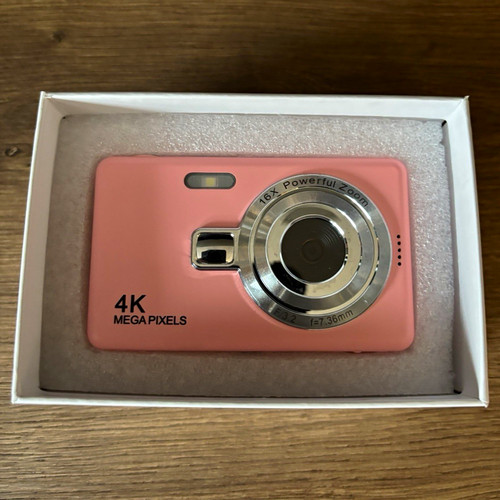 Pink compact digital camera - compact,